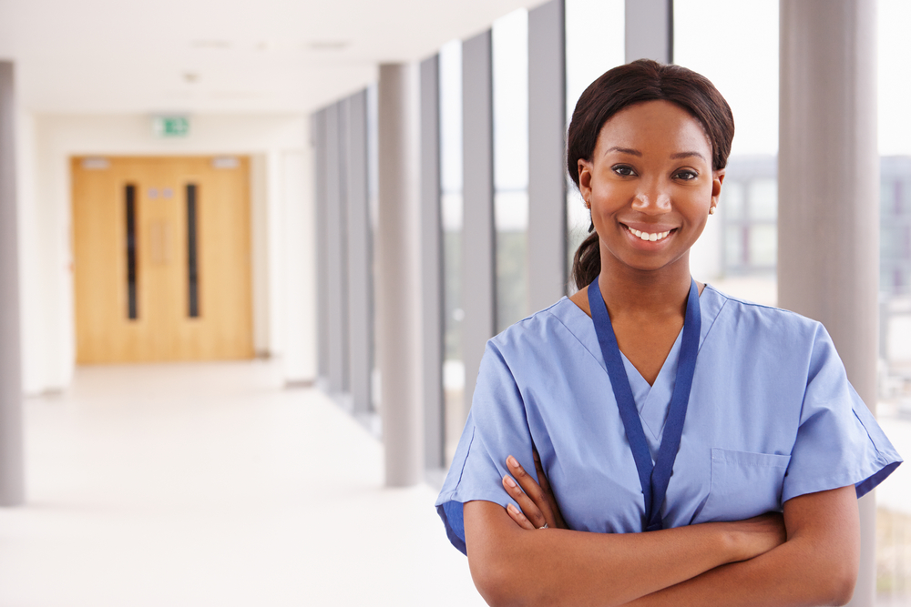 african american woman in blue scrubs